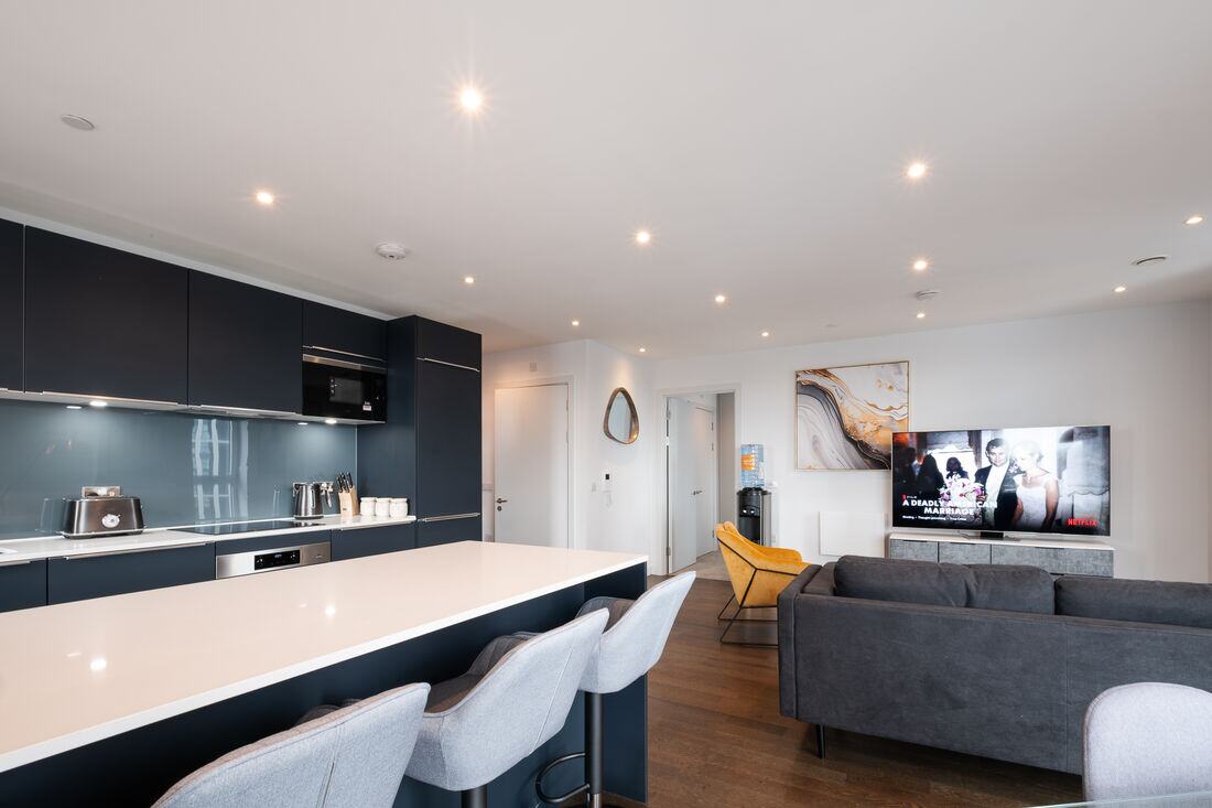 An open-plan kitchen and living space in a property managed by Torr Property Group.