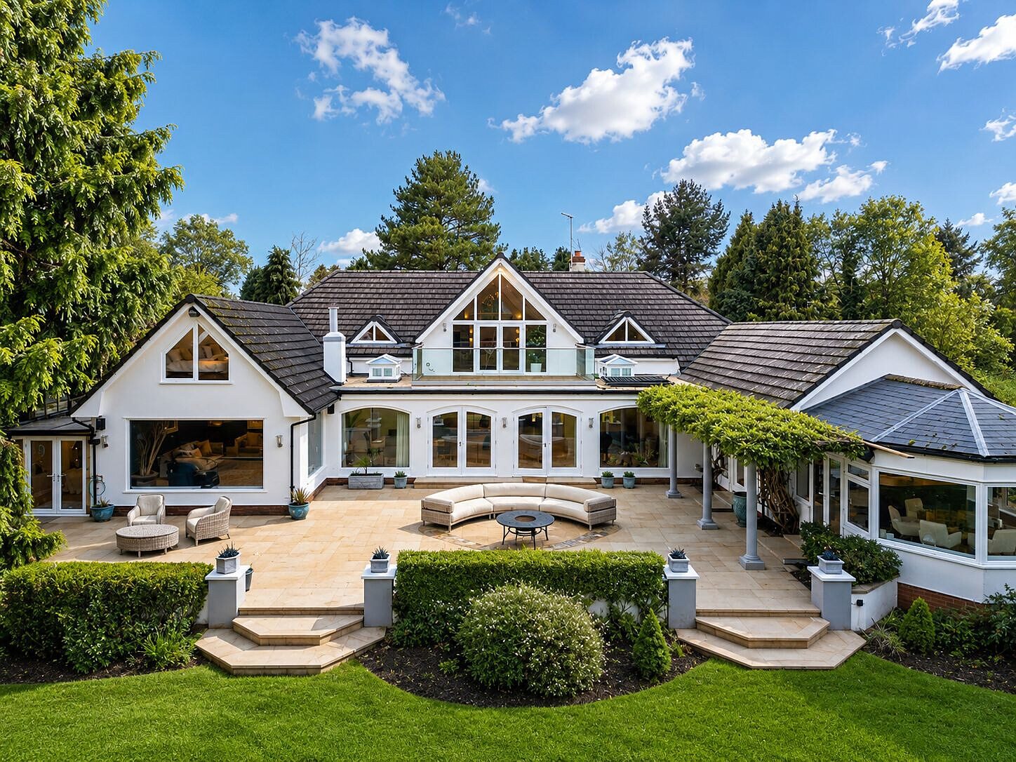 A large detached house with landscaped gardens managed by Torr Property Group.